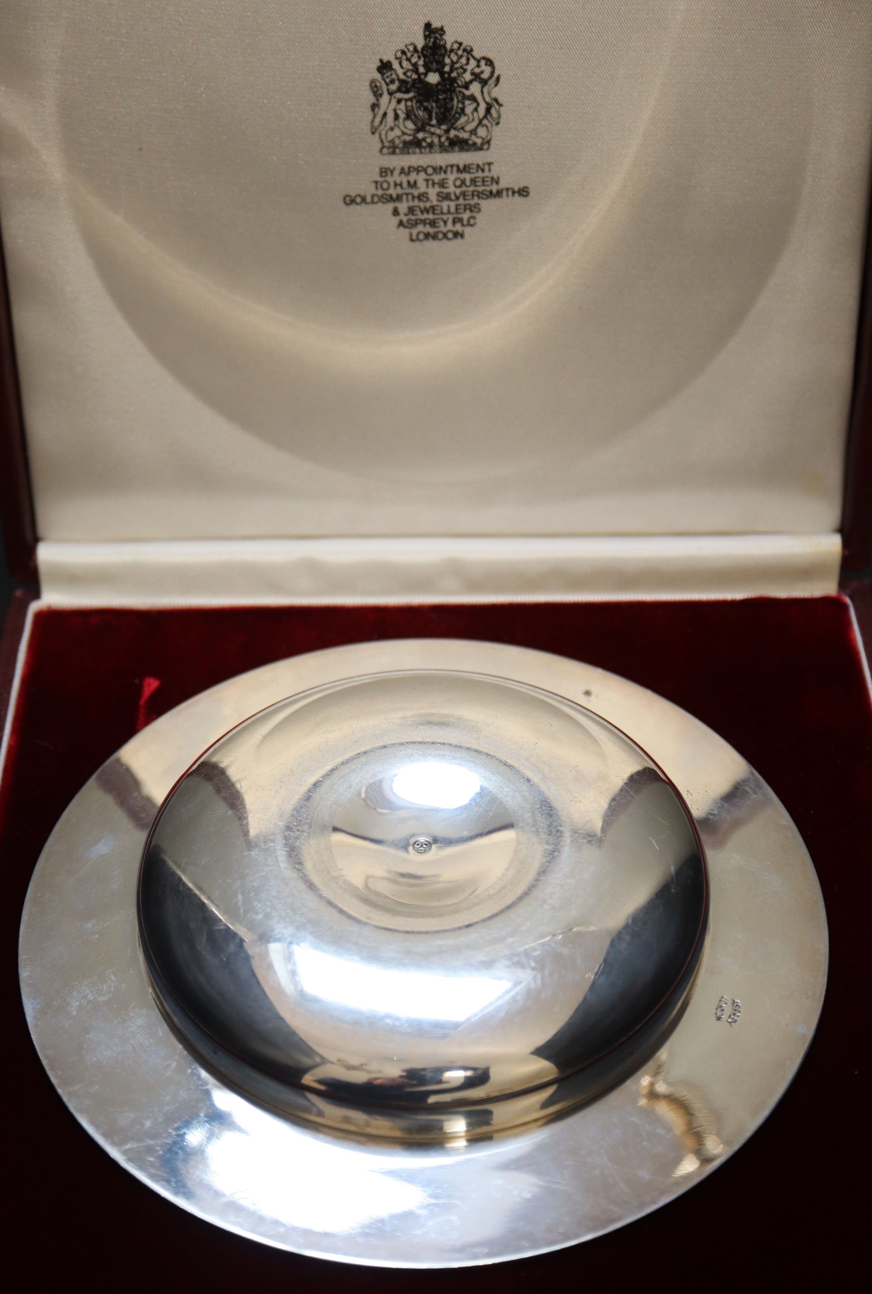 A cased modern silver Armada dish by Asprey & Co, 14.6cm, 5.5oz., in Asprey box.